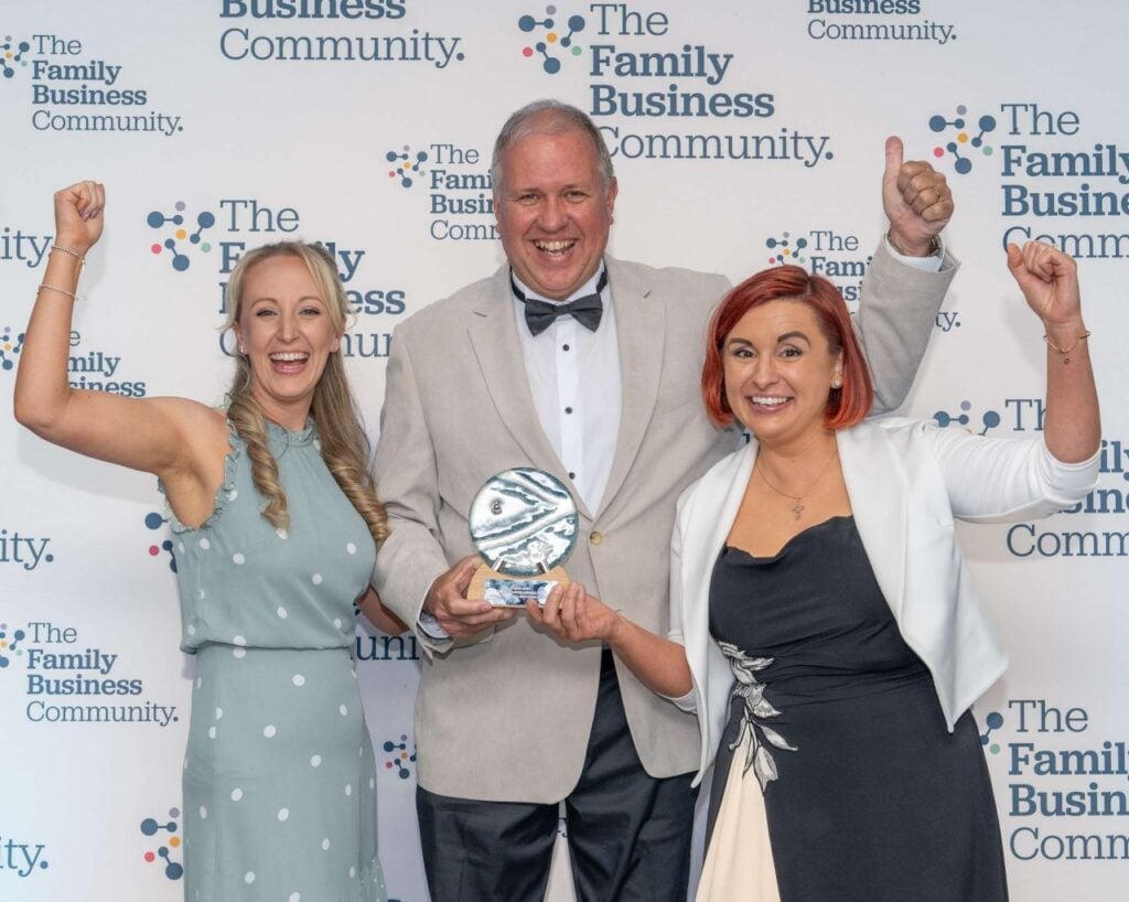 Bar 1 Brands and Nutreelife CEO Patrick Mroczak and employees receiving he Family Business Awards Manufacturing Excellence Award, 2025.